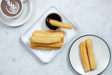 Churros,spanish traditional dessert and chocolate dipping