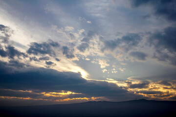 Beautiful cloudscape dusing the sunset. Evening sky view.