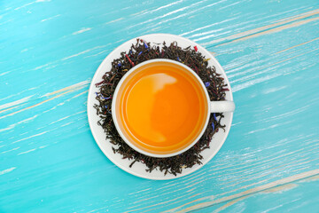 High resolution photo: Cup with tea , around brew