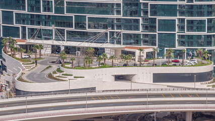 Promenade and palms seen from Dubai marina timelapse. Aerial view to JBR district