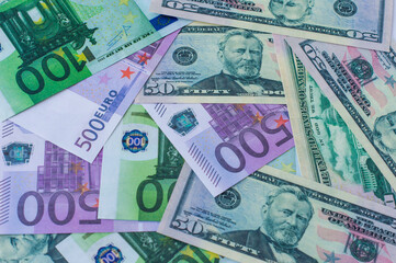 Fototapeta na wymiar background monetary euros and dollars. the concept of finance. a symbol of wealth and investment.