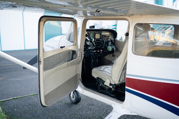Dashboard of a small, sporty aircraft for 4 people. View of displays and aircraft dashboard alarm clocks.