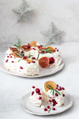  Meringues pavlova cake wreath with whipped cream, pomegranate and orange