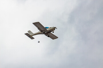 A small plane flies in the sky