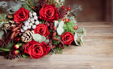Fototapeta na wymiar Christmas bouquet, romantic wedding bouquet with red roses.