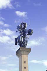 Fototapeta na wymiar communications tower full of bird nests, Oropesa,