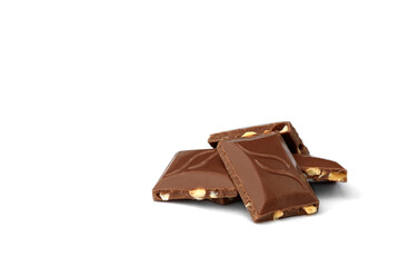Pieces of chocolate with nuts isolated on white background.