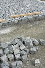 block or Belgian block, decorative stone paving, under construction