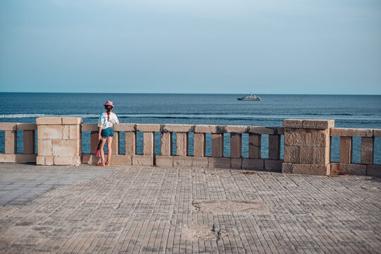 Santa Maria di Leuca, Italy-June 2021: a little girl lookink over the sea