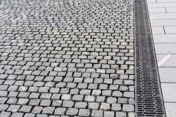 paving streets, roads and walkways with sett also known as a block or Belgian block