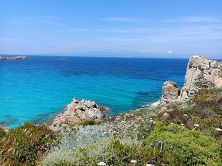 Fototapeta na wymiar Suggestivo orizzonte marino e paesaggio naturale presso Capo Coda cavallo Sardegna Italia