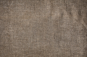 Burlap, natural coarse cloth, tablecloth with folds