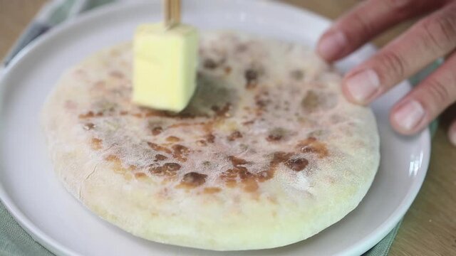 Preparing Khachapuri, cheese bread, traditional caucasian food