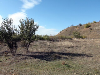 Panorama of the blue barely cloudy sky over the Dnieper steppes on a sunny autumn day.