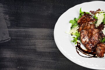 Oven baked tasty meat dish on the plate