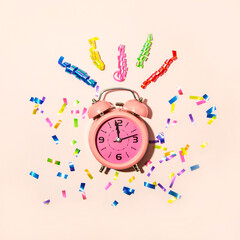 Countdown to the New Year. Festive party and celebration. 00:00 at the pink hour. Minimal idea of...