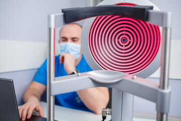 Microscopic apparatus for testing eyesight. Ophthalmology and treatment of eye diseases. Eye clinic, optometrist concept