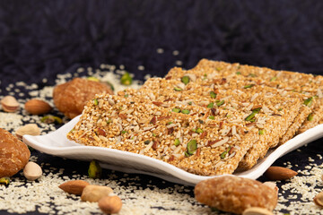 Winter Delicacy Makar Sankranti Or Lohri Mithai Pista Gajak Also Known As Gur Gajjak, Gazak, Gachak Til Patti Or Papdi, Tilkut Is Made Of Tilgul, Sesame Seeds, Jaggery Gud Almonds Badam And Pistachio