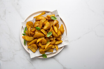 Golden roasted potatoes with spice on plate food