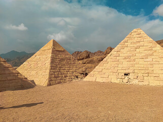 Pyramids in Egypt, ancient buildings and monuments. Statues in mini Cairo.