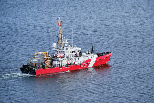 Red Canadian Coast Guard ship in harbour, seen from above.  Halifax, Canada. December 20, 2021.