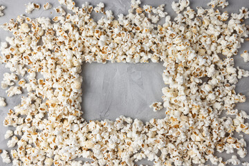Popcorn mockup on gray background. Cinema, movies and entertainment concept. Top view, copy space