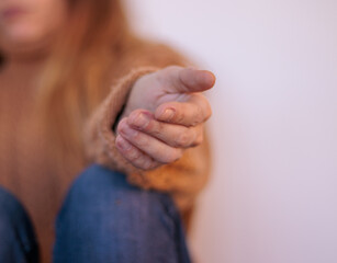 Woman's hand stop abuse on white background