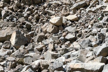 Sharp fragments of stone of different sizes as a structural background.