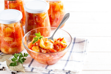 Marinated vegetables in tomato for the winter. Copy space