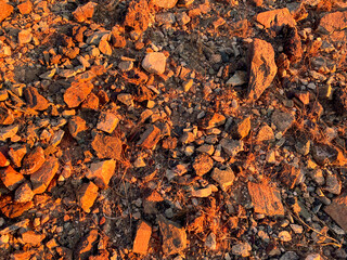 sunset shining on desert stones and rocks evening shadows