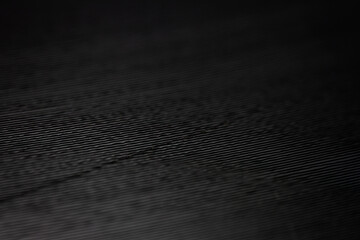 Macro shot of vinyl record showing scratches