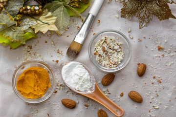 Organic, homemade face pack with almond powder, turmeric powder and flour for instant glow and...