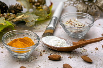 Organic, homemade face pack with almond powder, turmeric powder and flour for instant glow and...