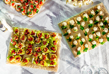 food buffer catering. Different canapes and appetizer on table