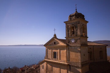 Church of the Assumption of Mary in panoramic views ,built around 1500 with The square bell tower.Trevignano Romano,Italy