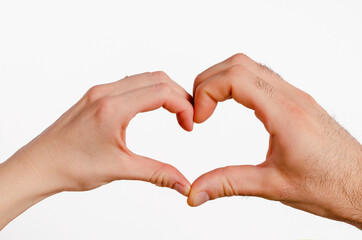 Male and female hands forming a heart on white background. Family concept.