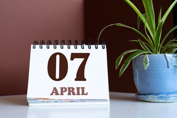 Save the Date written on a calendar - April 07