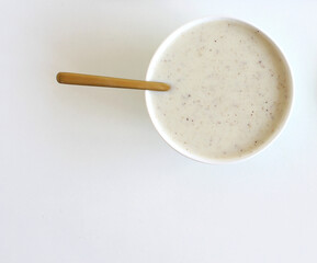 Refreshing milkshakes or smoothiesapple and kiwi. On a white wooden table, copy space, top view.