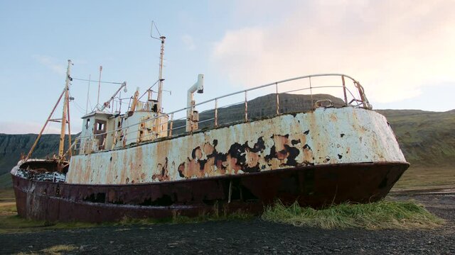 View from behind the wreck of a stranded and abandoned ghost ship Gardar BA 64 in Iceland