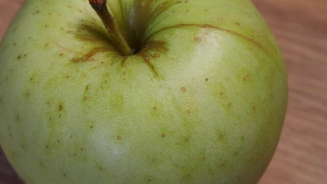 Apple of the Reinette Simirenko variety, macro video. The Reinette Simirenko is an antique apple variety.
