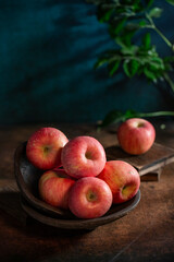 Fresh apples on the  wooden table