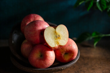 Fresh apples on the  wooden table