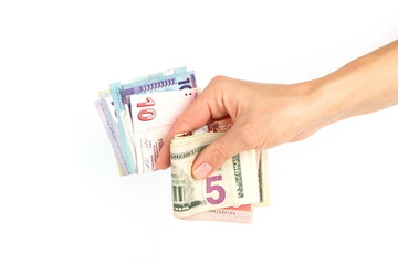 Different money from all over the world in the hand