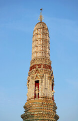 Spire Top of Wat Arun Satellite Prang with Wind God on Horseback, an Iconic Landmark of Bangkok, Thailand