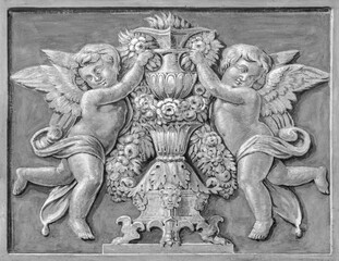ROME, ITALY - AUGUST 28, 2021: The baroque fresco of angels in the church Chiesa dei Santi Vincenzo e Anastasio a Trevi.