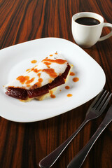 Brazilian flatbread called Tapioca. Sweet tapioca with guava paste and cup of coffee.