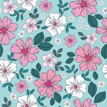 Vintage floral background. Seamless vector pattern for design and fashion prints. Floral pattern with small white and pink flowers, green leaves on a light blue background.