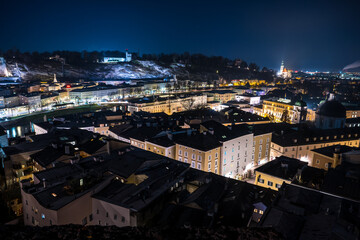 salzburg city at night from Kapuzinerberg towards Mönchsberg