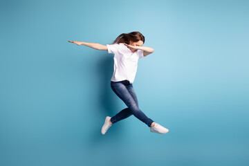 Fototapeta na wymiar Full body photo of young attarctive girl jump up dance dab chill isolated over blue color background