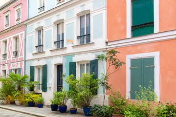 Fototapeta na wymiar Paris, colorful houses rue Cremieux, typical street 